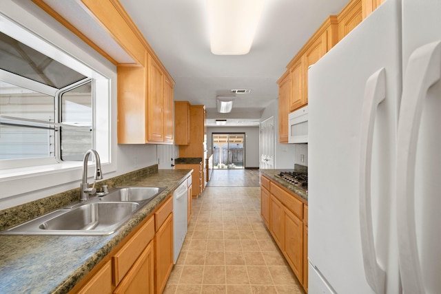 1530 Carmel Way, Red Bluff, CA 96080 - kitchen with white appliances, a sink, light tile patterned floors, dark countertops, and light brown cabinets