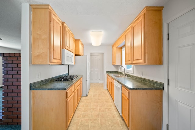 1530 Carmel Way, Red Bluff, CA 96080 - kitchen with white appliances, a sink, dark countertops, light tile patterned floors, and light brown cabinetry