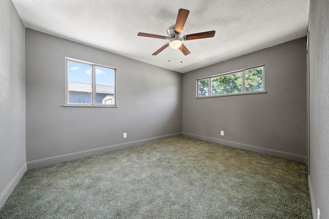 1530 Carmel Way, Red Bluff, CA 96080 - spare room featuring carpet flooring, ceiling fan, baseboards, and a textured ceiling
