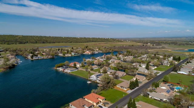 bird's eye view with a water view and a residential view