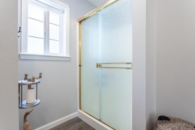 12637 Ivie Ln, Old Station, CA 96071 - full bathroom featuring a shower stall, wood finished floors, and baseboards
