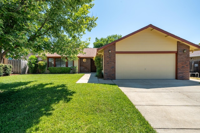 2529 Candlewood Dr, Redding, CA 96003 - ranch-style house with brick siding, a garage, and concrete driveway