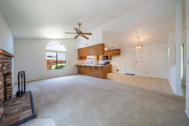 2529 Candlewood Dr, Redding, CA 96003 - unfurnished living room featuring light colored carpet, a ceiling fan, a brick fireplace, a chandelier, and light tile patterned flooring