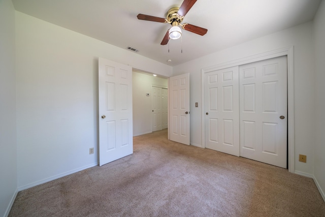2529 Candlewood Dr, Redding, CA 96003 - unfurnished bedroom with carpet, a closet, and a ceiling fan