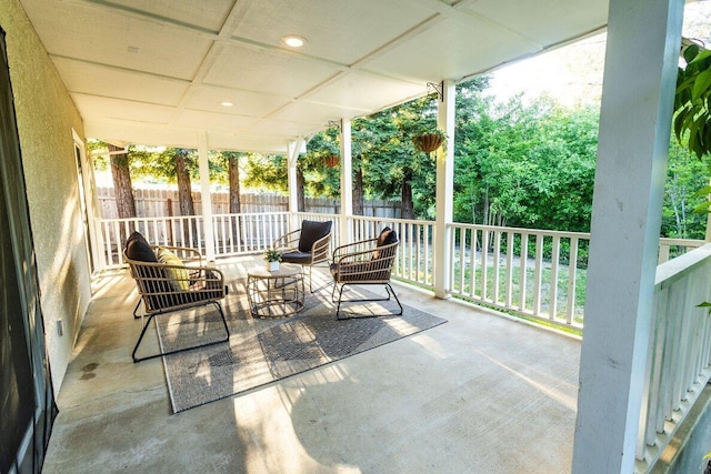 view of patio featuring fence