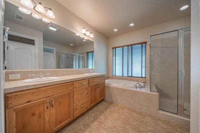 3641 Deuce Way, Redding, CA 96002 - full bath with a shower stall, a garden tub, tile patterned flooring, double vanity, and recessed lighting