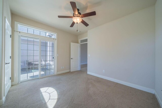 3641 Deuce Way, Redding, CA 96002 - empty room with light carpet, ceiling fan, and baseboards