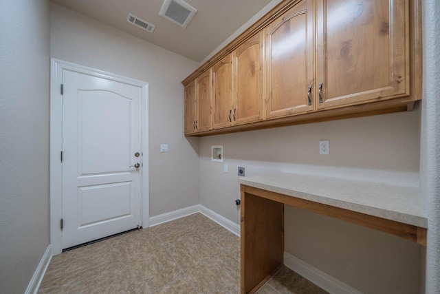 3641 Deuce Way, Redding, CA 96002 - clothes washing area featuring hookup for an electric dryer, cabinet space, hookup for a washing machine, an office area, and baseboards