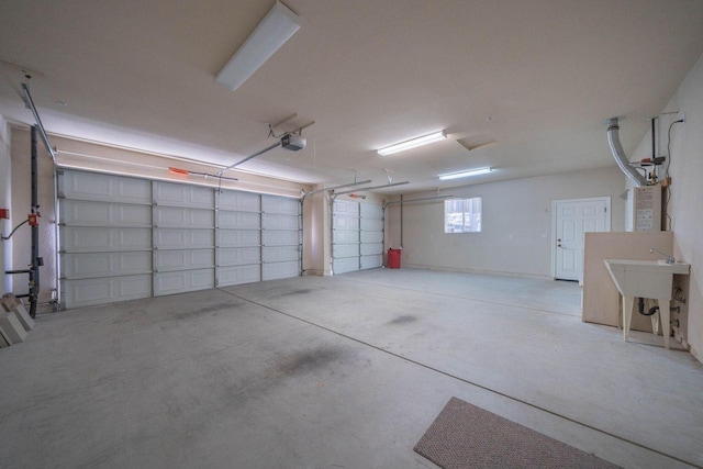 3641 Deuce Way, Redding, CA 96002 - garage featuring a garage door opener
