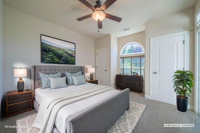 3641 Deuce Way, Redding, CA 96002 - bedroom with light carpet, baseboards, and ceiling fan