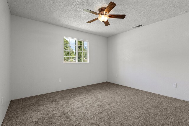 19017 Snowflake Ln, Redding, CA 96003 - carpeted spare room featuring a ceiling fan and a textured ceiling