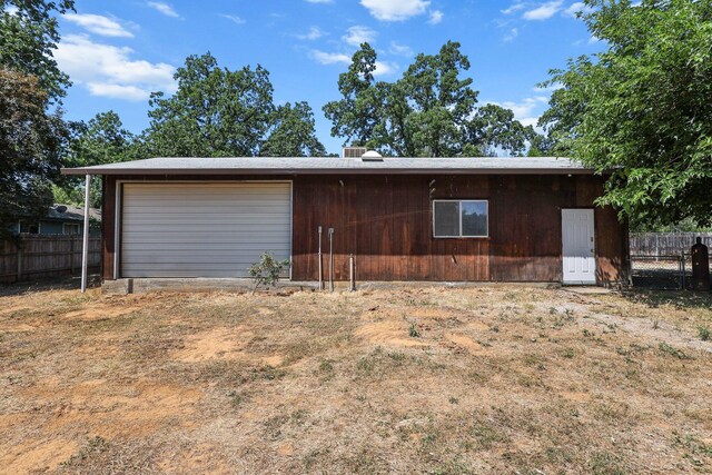 19017 Snowflake Ln, Redding, CA 96003 - view of front of home with a garage and dirt driveway