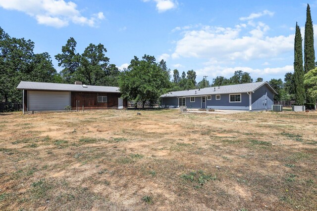 19017 Snowflake Ln, Redding, CA 96003 - view of yard with a garage, a patio area, and central air condition unit