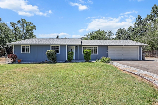 19017 Snowflake Ln, Redding, CA 96003 - single story home featuring asphalt driveway and a garage