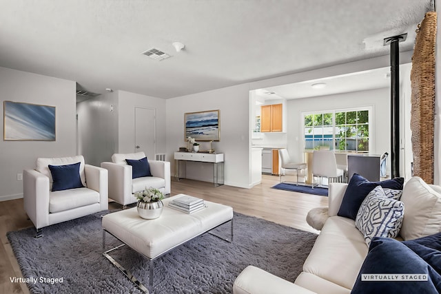 19017 Snowflake Ln, Redding, CA 96003 - living area with light wood finished floors and baseboards