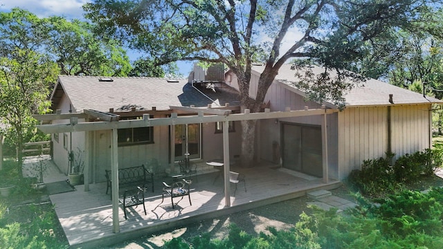 21030 Shangrila Dr, Red Bluff, CA 96080 - rear view of property featuring a deck, roof with shingles, and french doors