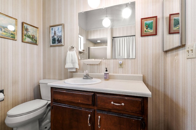 21030 Shangrila Dr, Red Bluff, CA 96080 - full bath featuring wallpapered walls, vanity, toilet, and an enclosed shower