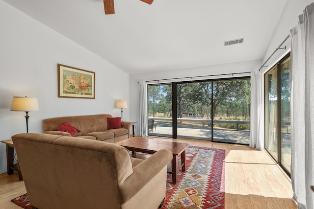 21030 Shangrila Dr, Red Bluff, CA 96080 - living room featuring wood finished floors, vaulted ceiling, and a ceiling fan