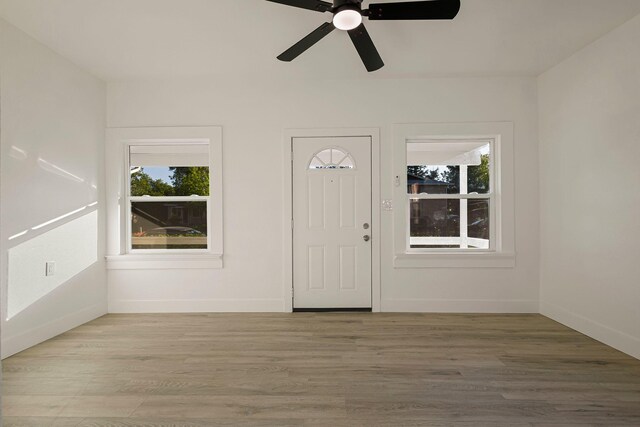 1048 Franklin St, Red Bluff, CA 96080 - entryway featuring wood finished floors, baseboards, and a ceiling fan