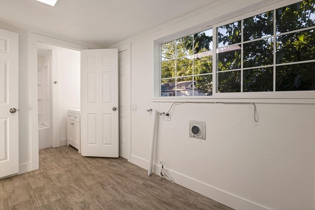 1048 Franklin St, Red Bluff, CA 96080 - washroom with baseboards and electric dryer hookup