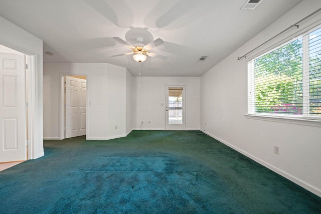 unfurnished bedroom with baseboards, carpet flooring, and ceiling fan