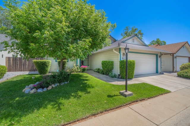 427 Yolla Bolly Trl, Redding, CA 96003 - view of front of property featuring an attached garage, concrete driveway, and a shingled roof