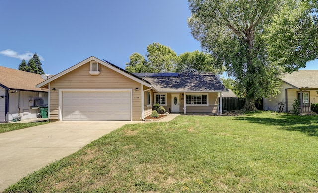 3268 Lyndsey Ln, Anderson, CA 96007 - ranch-style house featuring an attached garage, solar panels, concrete driveway, and a shingled roof
