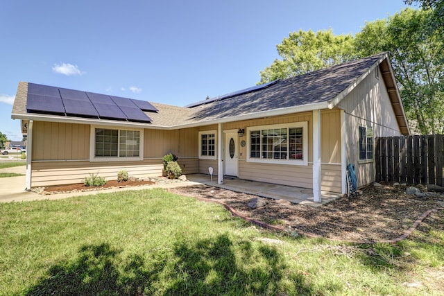 3268 Lyndsey Ln, Anderson, CA 96007 - single story home featuring solar panels, roof with shingles, and a patio area
