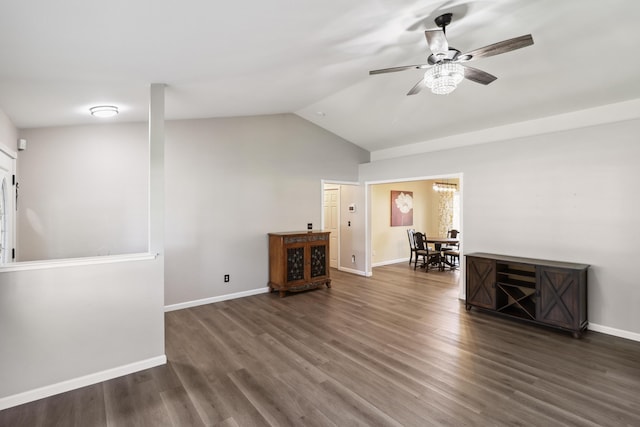 3268 Lyndsey Ln, Anderson, CA 96007 - living room featuring lofted ceiling, ceiling fan, wood finished floors, baseboards, and a chandelier