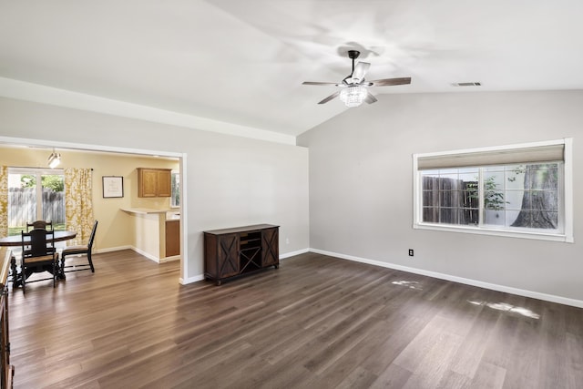 3268 Lyndsey Ln, Anderson, CA 96007 - unfurnished living room with lofted ceiling, ceiling fan, dark wood finished floors, and baseboards