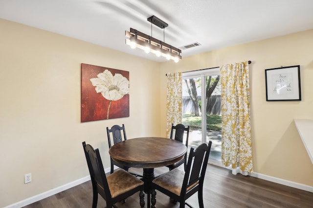 3268 Lyndsey Ln, Anderson, CA 96007 - dining space featuring baseboards and dark wood finished floors