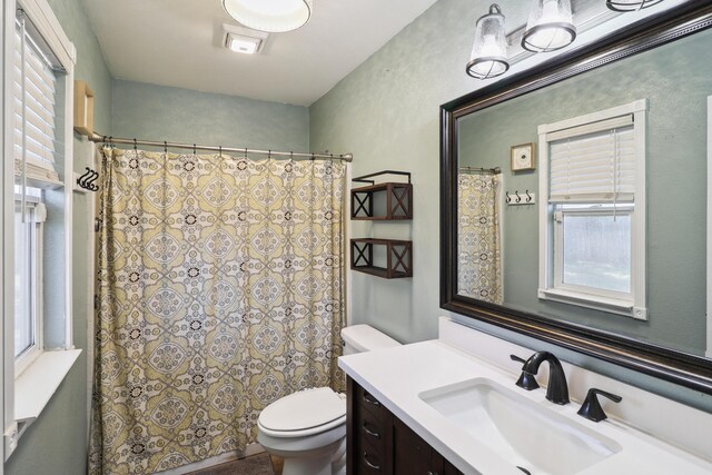3268 Lyndsey Ln, Anderson, CA 96007 - bathroom with toilet, vanity, and a shower with shower curtain