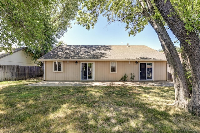 3268 Lyndsey Ln, Anderson, CA 96007 - back of property with a patio area and roof with shingles