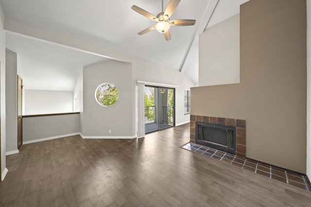 426 Ridgecrest Trl Unit 223, Redding, CA 96003 - unfurnished living room with wood finished floors, a tiled fireplace, a ceiling fan, and high vaulted ceiling