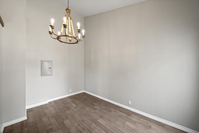 426 Ridgecrest Trl Unit 223, Redding, CA 96003 - empty room with a chandelier and dark wood-style floors