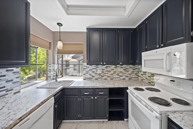426 Ridgecrest Trl Unit 223, Redding, CA 96003 - kitchen featuring white appliances, light marble finish floors, light stone countertops, decorative backsplash, and a raised ceiling
