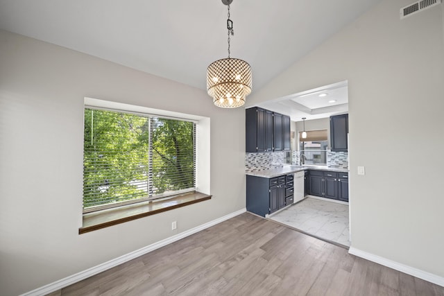 426 Ridgecrest Trl Unit 223, Redding, CA 96003 - unfurnished dining area featuring light wood-type flooring, a chandelier, and recessed lighting