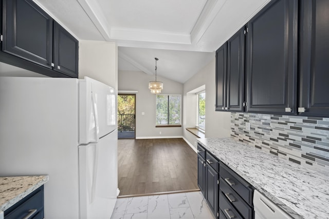 426 Ridgecrest Trl Unit 223, Redding, CA 96003 - kitchen with white appliances, backsplash, plenty of natural light, vaulted ceiling, and light stone countertops