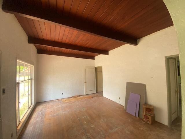 spare room featuring wooden ceiling and wood finished floors