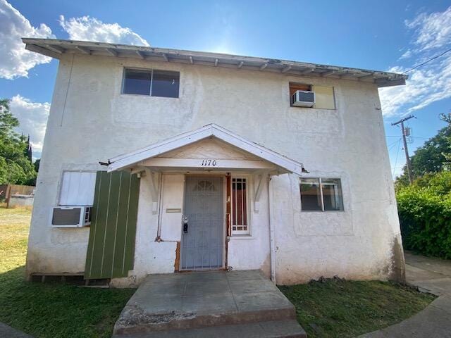 view of front of home featuring stucco siding