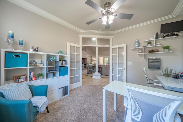 carpeted office space with french doors, ornamental molding, and ceiling fan