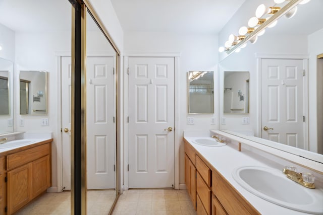 bathroom featuring double vanity