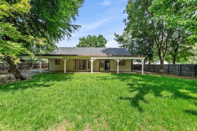 back of house featuring french doors and a patio area