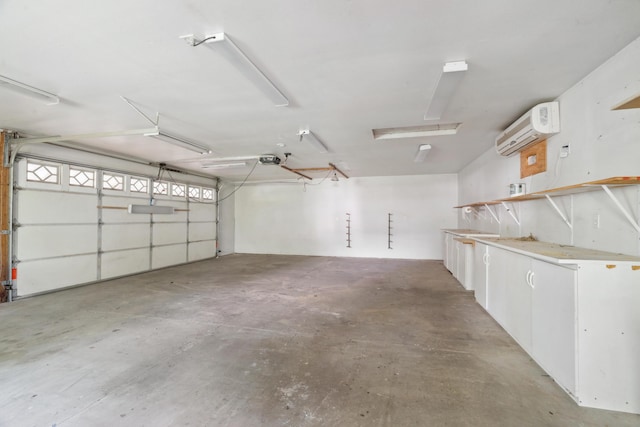 garage with a wall mounted air conditioner
