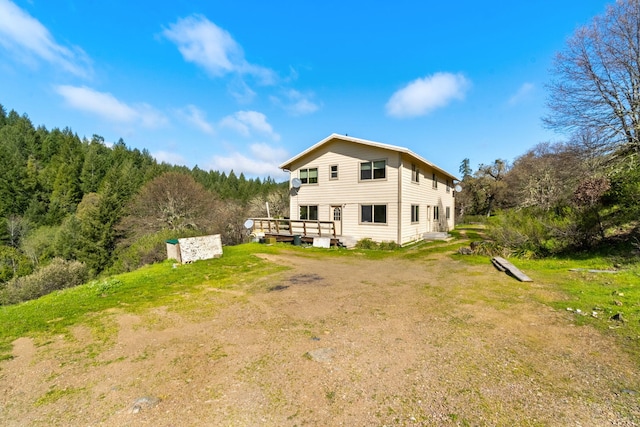 8686 Bell Springs Rd, Garberville, CA 95542 - back of property with a deck and a yard