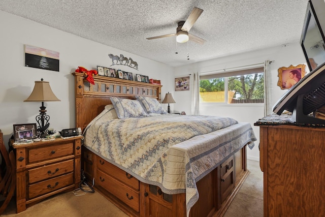 2350 Christian Ave, Redding, CA 96002 - bedroom with carpet flooring, a textured ceiling, and a ceiling fan