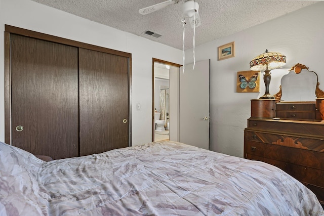 2350 Christian Ave, Redding, CA 96002 - bedroom featuring a textured ceiling, a closet, and ceiling fan