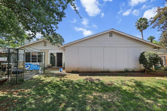 2350 Christian Ave, Redding, CA 96002 - rear view of property with a yard, a patio area, a gazebo, and board and batten siding