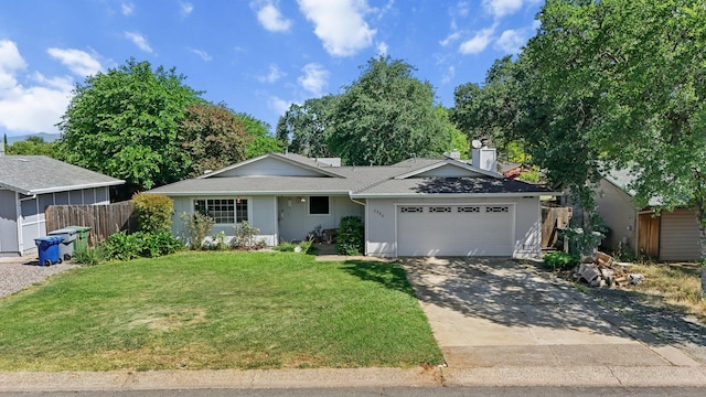 2350 Christian Ave, Redding, CA 96002 - ranch-style home featuring an attached garage, concrete driveway, a shingled roof, and a chimney