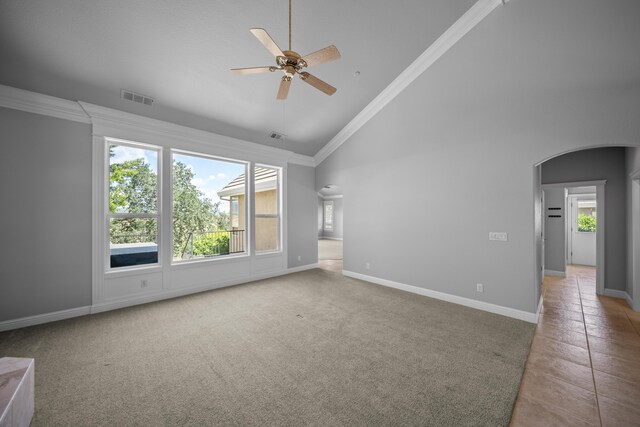 831 Santa Cruz Dr, Redding, CA 96003 - unfurnished room with arched walkways, high vaulted ceiling, a ceiling fan, baseboards, and crown molding
